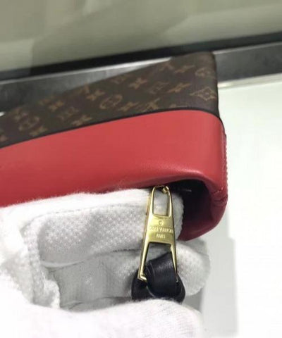 LV Pochette Tuileries Monogram Coated Canvas Red