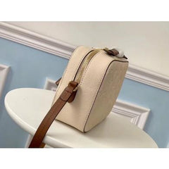 LV Saintonge Monogram Empreinte Leather Creme Caramel